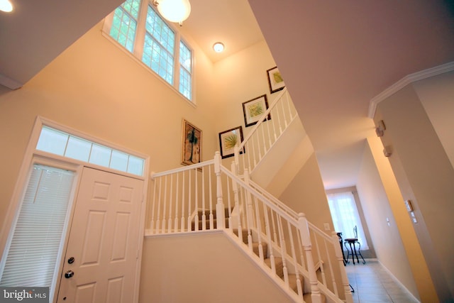 1300 Park Garden Ln, Reston, VA 20194 - tiled foyer entrance with a towering ceiling, stairway, and baseboards