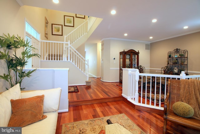 1300 Park Garden Ln, Reston, VA 20194 - foyer with wood finished floors, recessed lighting, ornamental molding, stairs, and baseboards