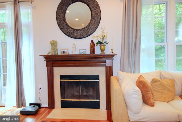 1300 Park Garden Ln, Reston, VA 20194 - living room with wood finished floors and a fireplace with flush hearth