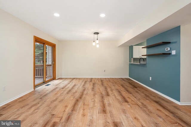 9441 Clocktower Ln, Columbia, MD 21046 - spare room featuring baseboards, light wood finished floors, and recessed lighting
