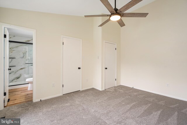 9441 Clocktower Ln, Columbia, MD 21046 - unfurnished bedroom with carpet flooring, vaulted ceiling, baseboards, and ensuite bath