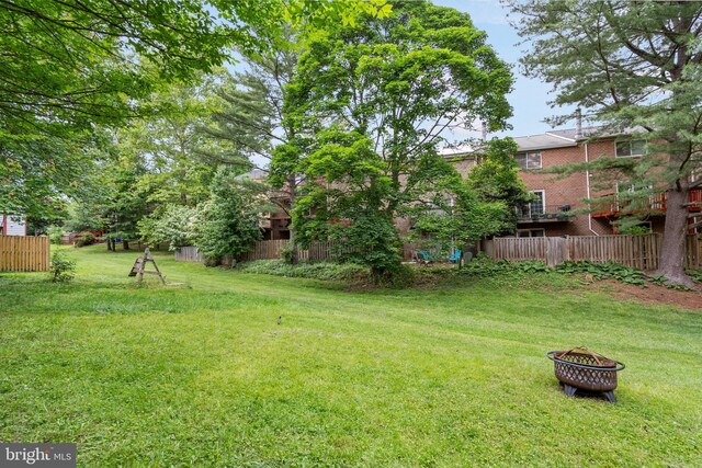 9441 Clocktower Ln, Columbia, MD 21046 - view of yard with an outdoor fire pit