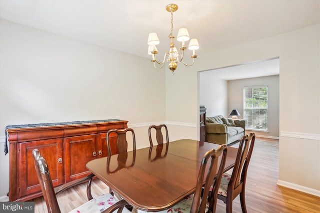 922 Pheasant Run Dr, Gaithersburg, MD 20878 - dining space with a chandelier, light wood-type flooring, and baseboards