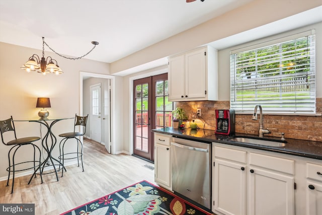 922 Pheasant Run Dr, Gaithersburg, MD 20878 - kitchen with dishwasher, a sink, tasteful backsplash, white cabinets, and a chandelier