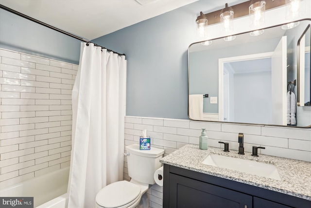 922 Pheasant Run Dr, Gaithersburg, MD 20878 - bathroom with toilet, vanity, shower / bath combination with curtain, tile walls, and a wainscoted wall