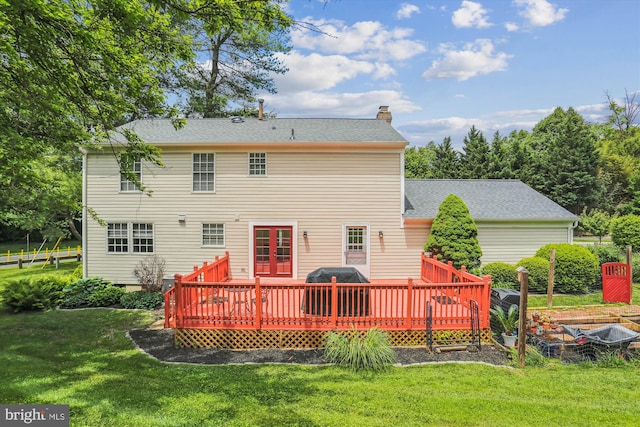 922 Pheasant Run Dr, Gaithersburg, MD 20878 - back of property with a deck, french doors, a chimney, a yard, and roof with shingles