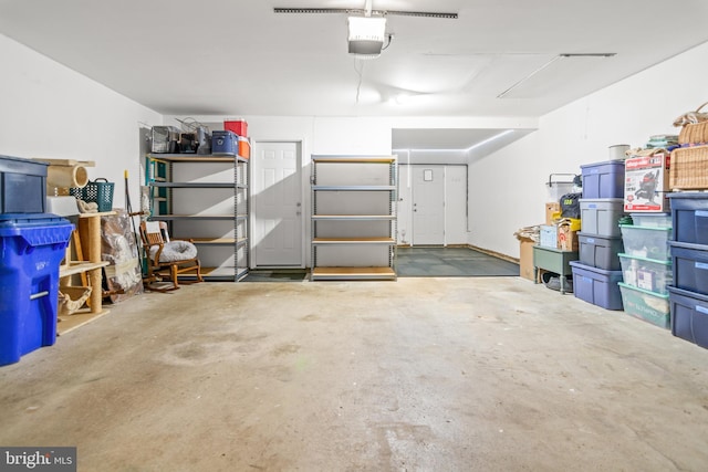 12419 Melling Ln, Bowie, MD 20715 - garage featuring a garage door opener