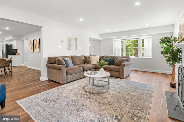 12419 Melling Ln, Bowie, MD 20715 - living room featuring wood finished floors, baseboards, and recessed lighting