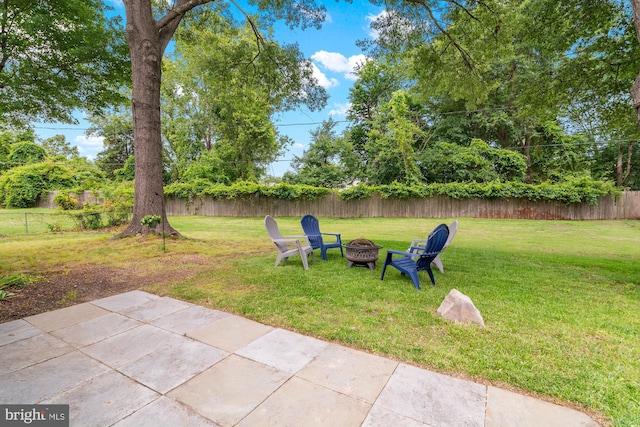 12419 Melling Ln, Bowie, MD 20715 - view of yard with an outdoor fire pit and a patio area