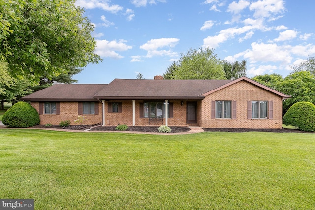 1199 Long Valley Rd, Westminster, MD 21158 - ranch-style home with a front yard, brick siding, and a chimney