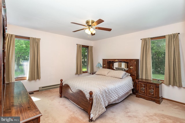 1199 Long Valley Rd, Westminster, MD 21158 - bedroom with a baseboard radiator, light carpet, and multiple windows