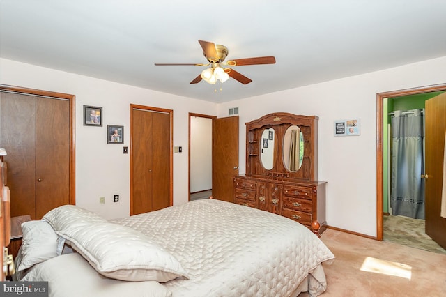 1199 Long Valley Rd, Westminster, MD 21158 - bedroom featuring light carpet, two closets, a ceiling fan, and baseboards