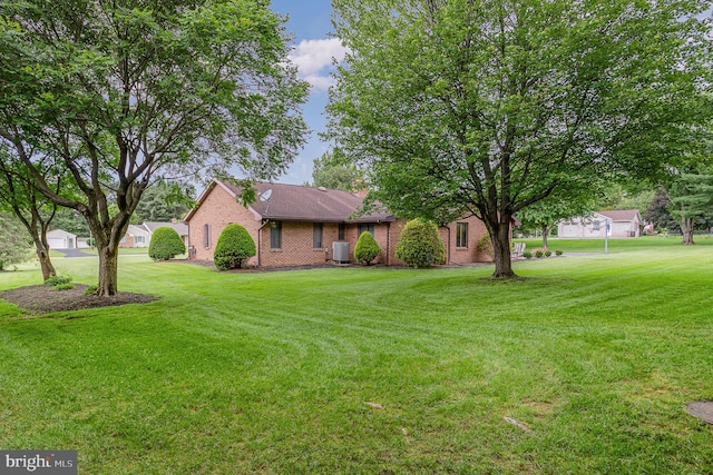 1199 Long Valley Rd, Westminster, MD 21158 - view of front of property featuring a front yard, brick siding, and cooling unit