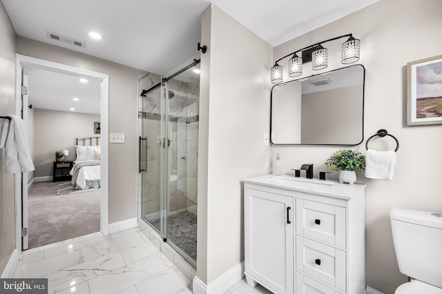 1402 W Old Cold Spring Ln, Baltimore, MD 21209 - ensuite bathroom featuring marble finish floors, a stall shower, recessed lighting, vanity, and toilet