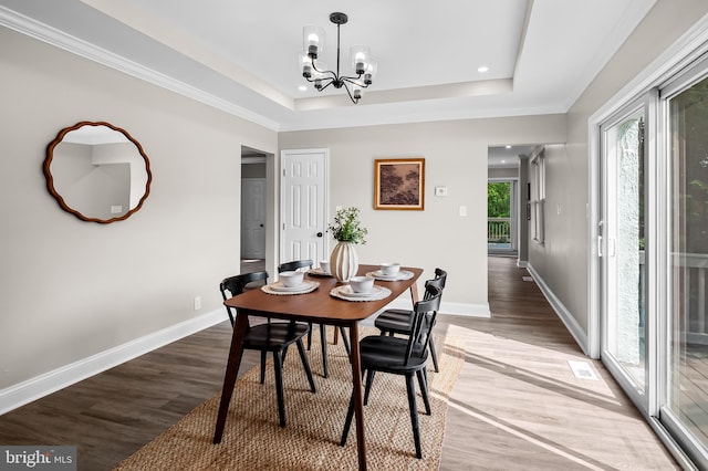 1402 W Old Cold Spring Ln, Baltimore, MD 21209 - dining room with light wood-style floors, a chandelier, baseboards, a tray ceiling, and recessed lighting