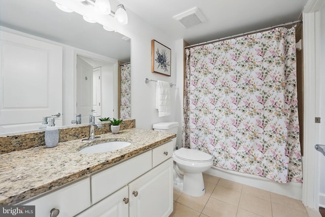 11800 Sunset Hills Rd Unit 717, Reston, VA 20190 - full bath featuring vanity, toilet, tile patterned flooring, and a shower with curtain