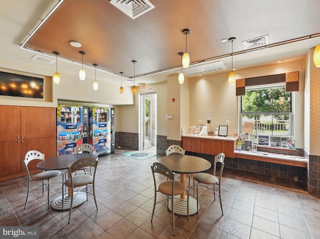 11800 Sunset Hills Rd Unit 717, Reston, VA 20190 - tiled dining area featuring wainscoting