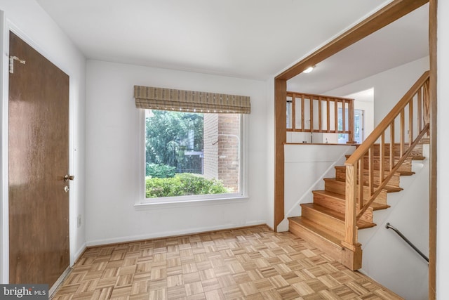 12403 Sir Lancelot Dr, Glenn Dale, MD 20769 - foyer featuring stairs and baseboards