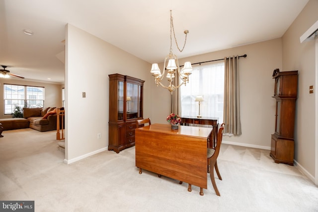 19 Cameron Ct, Royersford, PA 19468 - dining area with light carpet, a chandelier, and baseboards