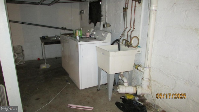 8804 48th Ave, College Park, MD 20740 - unfinished below grade area with washing machine and clothes dryer and a sink