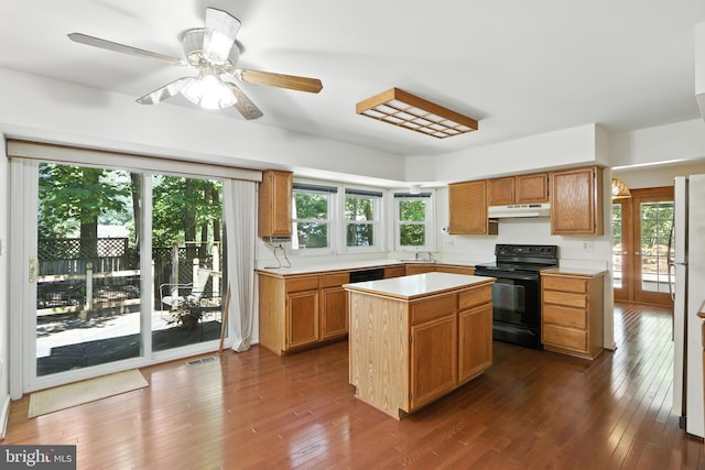 8225 Bubbling Spg, Laurel, MD 20723 - kitchen featuring black appliances, light countertops, and healthy amount of natural light