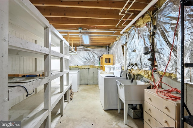 8225 Bubbling Spg, Laurel, MD 20723 - unfinished basement featuring washer and clothes dryer and a sink