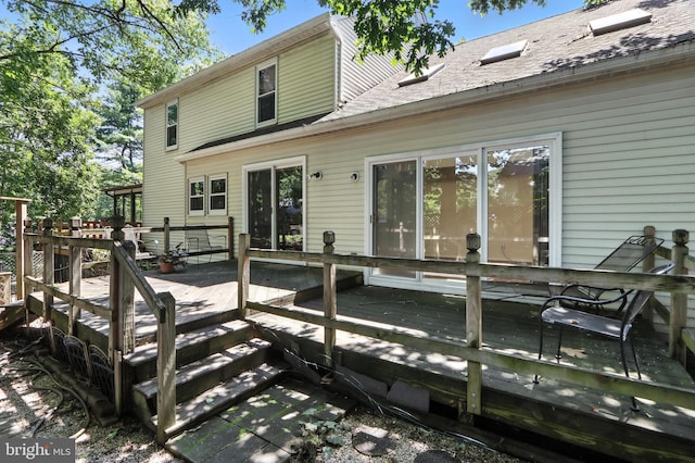 8225 Bubbling Spg, Laurel, MD 20723 - back of house with a deck