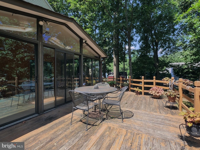 8225 Bubbling Spg, Laurel, MD 20723 - wooden terrace featuring a sunroom and outdoor dining space
