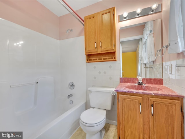 95 Comanche Dr, Auburn, PA 17922 - bathroom featuring vanity, shower / bathtub combination, tile walls, tasteful backsplash, and tile patterned floors