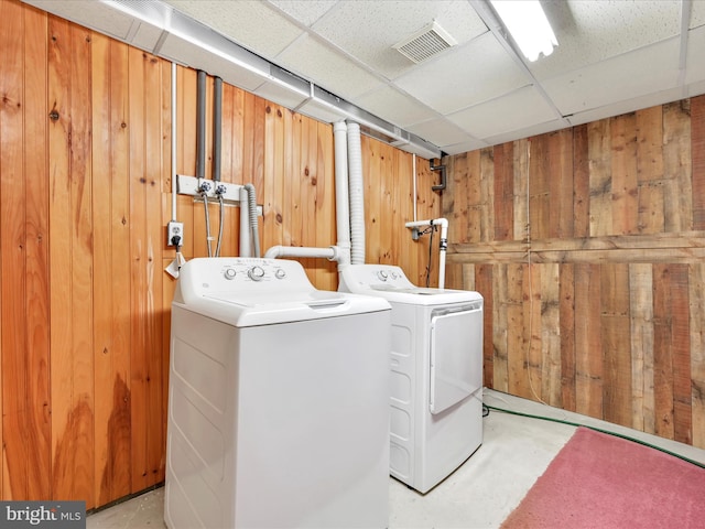 95 Comanche Dr, Auburn, PA 17922 - laundry area with independent washer and dryer and wood walls