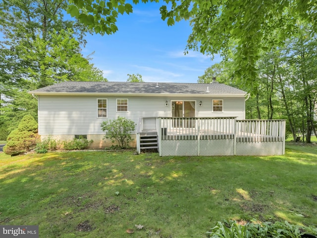 95 Comanche Dr, Auburn, PA 17922 - rear view of property featuring a yard, a deck, and a chimney