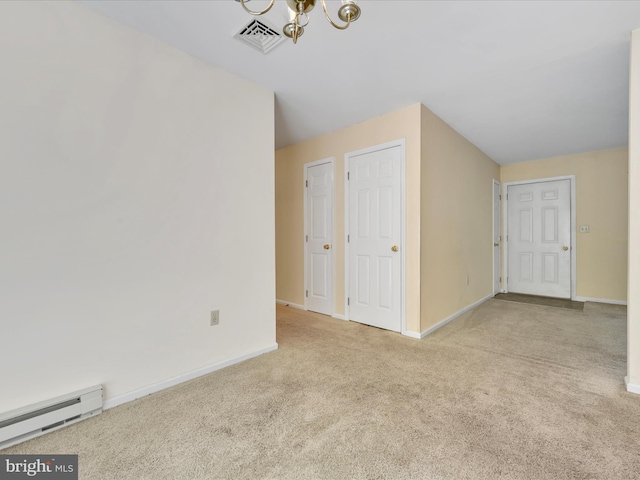 95 Comanche Dr, Auburn, PA 17922 - bonus room with baseboard heating, carpet floors, and a chandelier