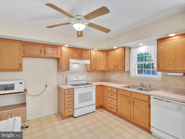 95 Comanche Dr, Auburn, PA 17922 - kitchen featuring white appliances, under cabinet range hood, tasteful backsplash, and light countertops