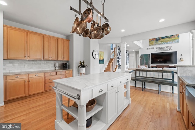 3 Graham Ct, Middletown, DE 19709 - kitchen featuring open shelves, decorative backsplash, light wood-style floors, light stone countertops, and recessed lighting