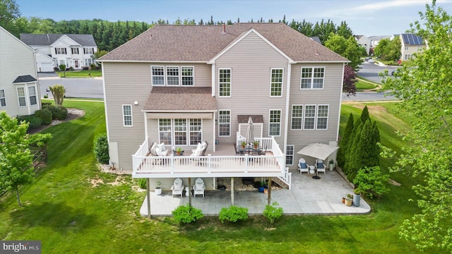 3 Graham Ct, Middletown, DE 19709 - back of property with a patio area, a lawn, a wooden deck, a shingled roof, and a gazebo