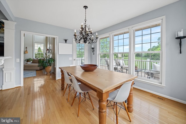 3 Graham Ct, Middletown, DE 19709 - dining area with light wood finished floors, a chandelier, and baseboards