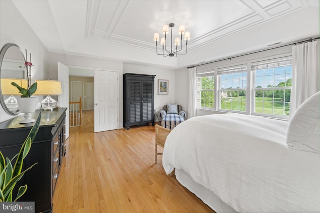 3 Graham Ct, Middletown, DE 19709 - bedroom with a raised ceiling, a chandelier, and light wood-type flooring