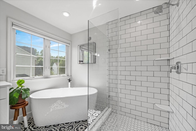 3 Graham Ct, Middletown, DE 19709 - full bath featuring a stall shower, a freestanding bath, recessed lighting, and tile patterned flooring