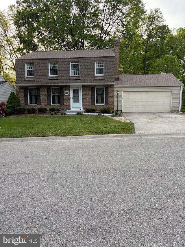 10263 Wayover Way, Columbia, MD 21046 - view of front of property with an attached garage, a front lawn, driveway, roof with shingles, and a chimney