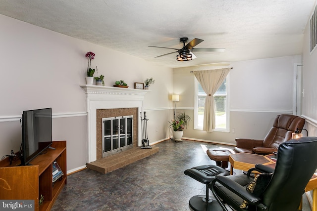 10263 Wayover Way, Columbia, MD 21046 - living area featuring a ceiling fan, a fireplace, baseboards, and a textured ceiling