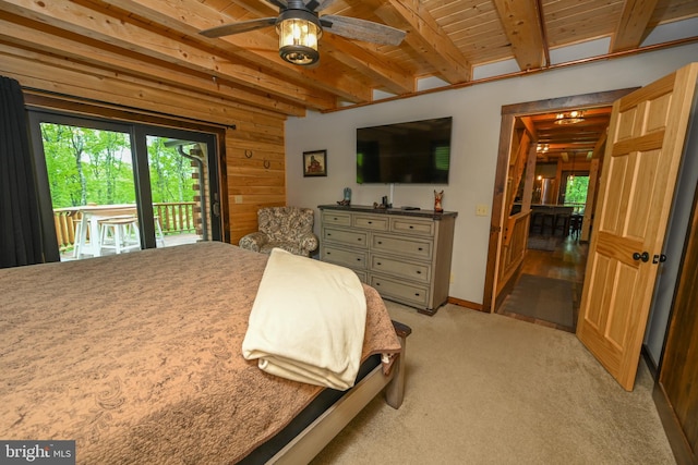90 Biltmore Ridge Trl, Mc Henry, MD 21541 - bedroom featuring access to outside, beam ceiling, wood walls, light carpet, and baseboards