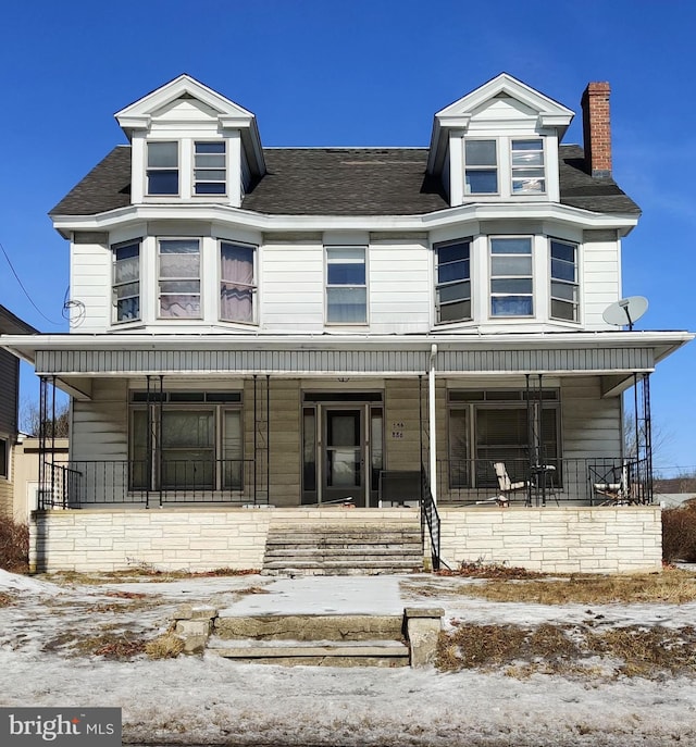 886 Barnesville Dr, Barnesville, PA 18214 - view of front of home featuring a porch, a chimney, and a shingled roof