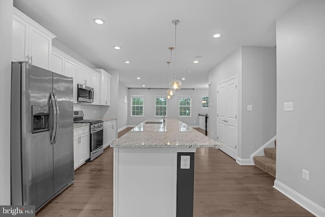23754 Myrtle Glen Way, California, MD 20619 - kitchen featuring appliances with stainless steel finishes, a sink, white cabinets, recessed lighting, and a kitchen island with sink
