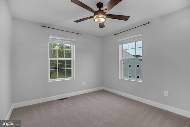 23754 Myrtle Glen Way, California, MD 20619 - empty room with ceiling fan, plenty of natural light, and baseboards