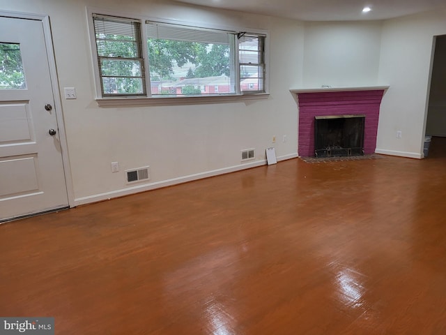5900 Arbroath Dr, Clinton, MD 20735 - unfurnished living room with wood finished floors, a fireplace, baseboards, and recessed lighting