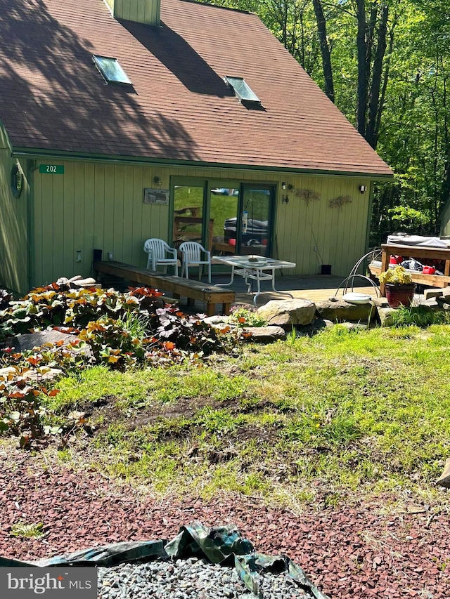 202 Tepee Dr, Pocono Lake, PA 18347 - view of front facade with a shingled roof
