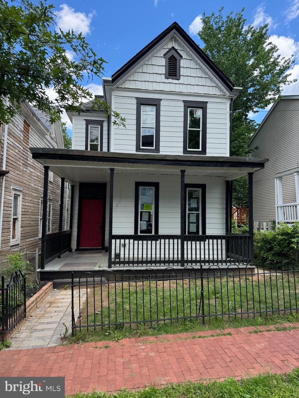 1358 Valley Pl SE, Washington, DC 20020 - view of front of house featuring covered porch and a fenced front yard