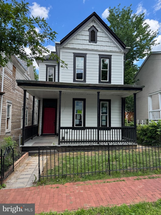 1358 Valley Pl SE, Washington, DC 20020 - view of front of house featuring covered porch and a fenced front yard
