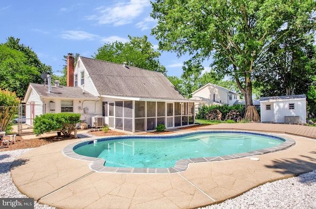 2912 Barrister Ln, Bowie, MD 20715 - view of pool with a sunroom, central AC, and a patio area