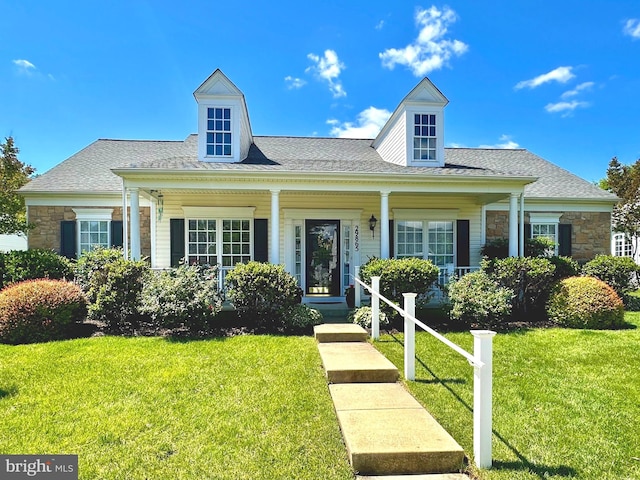 29865 Hillary Ave, Easton, MD 21601 - view of front facade with a front yard, stone siding, and covered porch